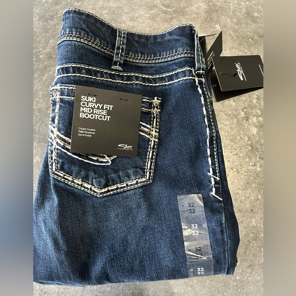 Brand new Silver boot cut jeans